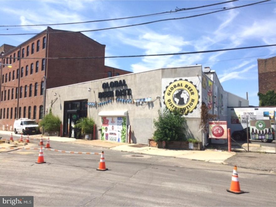 Attn Investors & developers. 9600 sq ft commercial building with long term tenant (now month to month) since 2010 . Tenant pays approximately 7k/month. Property is in the heart of N. Liberties. Tons of potential here. Keep the tenant and enjoy the appreciation as the area continues to evolve in your buy & hold strategy. For the developer perhaps build on top to the existing structure condo's/apartment and use the lower level as indoor parking for the units above. Another possibility is commercial space(stores)on the 1st flr with units above. The lot itself is approximately 17k sq ft and offers pretty good parking now. There is an office behind the counter with 1 bathroom. Location is minutes from center city via N.2nd street. With the Piazza next store and N.2nd business community growing this is desirable location. Public trans with the Girard ave trolley at the corner and Market/Frankford line couple blocks away makes this a convenient location. Minutes to the Ben Franklin Bridge(to NJ) is another  benefit. All the development on the north side of Girard(19122) will only help the N. Liberties area grow in value and desirability.