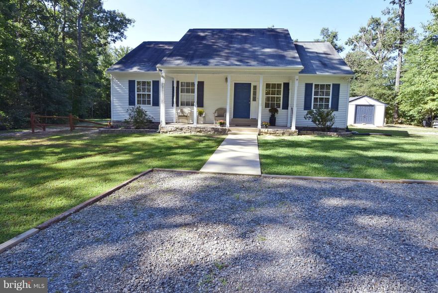 Cute as a button/must see. Privacy plus wildlife surrounds  this home on 1.63 acres. Wood floors and chair rail, ceramic floors in kitchen w/ large pantry and walk out to side house and rear deck.  Ceiling fans through out, HVAC replaced 2014, conditioned crawl space, Shed with electric. Large back yard that backs to trees. Minutes to shopping and commute.  Private oasis.