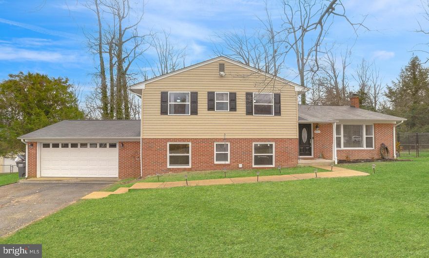 Beautifully Renovated Home with an Open Floorplan in the Well-Established Neighborhood of Esperanza Farms. Bright Kitchen with Stainless Appliances, Gleaming Granite, Subway Tile Backsplash and a Huge Island with Additional Seating.  Large Combined Living Room and Dining Room are perfect for Entertaining.  New Hardwood Floors Throughout and Most Major Systems under Five Years Old to include Roof, Septic and Appliances.  Up a Half Flight of Stairs are Three Lovely Bedrooms and Two Remodeled Bathrooms. Half Flight of Downstairs boasts a Fourth Bedroom and another Full Bathroom, plus a Cozy Family Room with Wood Burning Fireplace.  Dreamy Laundry Room has plenty of space for Folding and Crafting.  Large, Unfinished, Temperature-Controlled Basement has Endless Possibilities, to include Plenty of Space for Storage! Patio overlooks a Gorgeous Half Acre Lot that Backs to Trees and Offers Privacy.  Two Car Garage with Automatic Door Opener.  Only Two Minutes from Elementary School, Three Minutes from Shopping/Restaurants/Gym, and Five minutes from Pax River NAS.  Community Water Access and no HOA!  Pride in Ownership Shows.  A Charming Home.