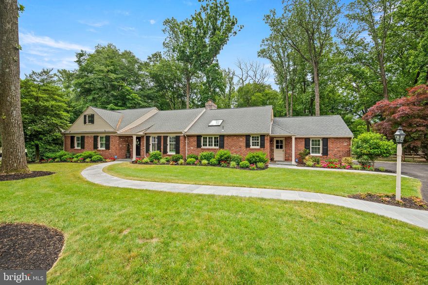 Great opportunity to own this breathtaking five bedroom colonial cape in Radnor township on a cul-de-sac street. This home is completely redone, move in ready and in one of the most desirable neighborhoods in Wayne.  Prepare for the wow factor as you enter the entrance hall leading to the spacious living room with new recessed lighting,  wood burning fireplace, and a large picture window allowing lots of natural light and enjoyment of every season. The formal dining room is perfect for family gatherings and has new lighting, crown moulding  and elegant wainscoting.  Beautiful hardwood flooring thru out .  The stunning new kitchen features white custom cabinetry, a large center island with quartz countertops, Wolf  Gas Range and built in microwave, Subzero refrigerator and Thermador dishwasher.  This stunning area also has a new custom pantry, breakfront and Uline wine fridge.  The open concept adjoins the amazing family room with granite surround fireplace, teak wood flooring, and leads to the new Pa bluestone patio.  There is also a convenient mud room area from the kitchen with builtins,  coat closet, new elegant powder room,  and access to an attached two car garage with attic access, new garage door, windows and lighting.   Additionally on the the first floor is the primary suite with custom closet built-ins and all new bath with Carrera marble tile, Cambria quartz countertops, custom glass shower enclosure, and double sink vanity.  Across the hall there is also a new guest suite with an ensuite all new custom bath with high end features. A convenient new laundry room with custom cabinetry and custom closet complete this level.
Upstairs you will find a very spacious Bedroom with a cozy desk/reading area and a new custom  hall bath with Carrera marble tile and a combo tub/shower. Two additional  bedrooms which could also be perfect for home office/ den or media area finish the second level. 
The large  basement has new windows and could be easily finished and provides plenty of storage space and has walkout access to the rear yard.  The beautiful level and private backyard has new custom fencing making this area secure for children and pets as well as ideal for outside enjoyment.   Additional features and upgrades include custom plantation shutters, a new alarm system, independent HVAC unit added for the second floor and all new hardware on interior doors.  Extensive landscaping has been done with landscape lighting. The driveway was recently repaved and new posts at front and side door were added with a new Pa bluestone wide walkway.  Award-winning Schools, easy access  to major arteries, airport, train and parks.  Enjoy all downtown Wayne and Radnor have for shopping and dining!  Main Line living at its best.  Tastefully done and ready for you  to call home...a must see.
