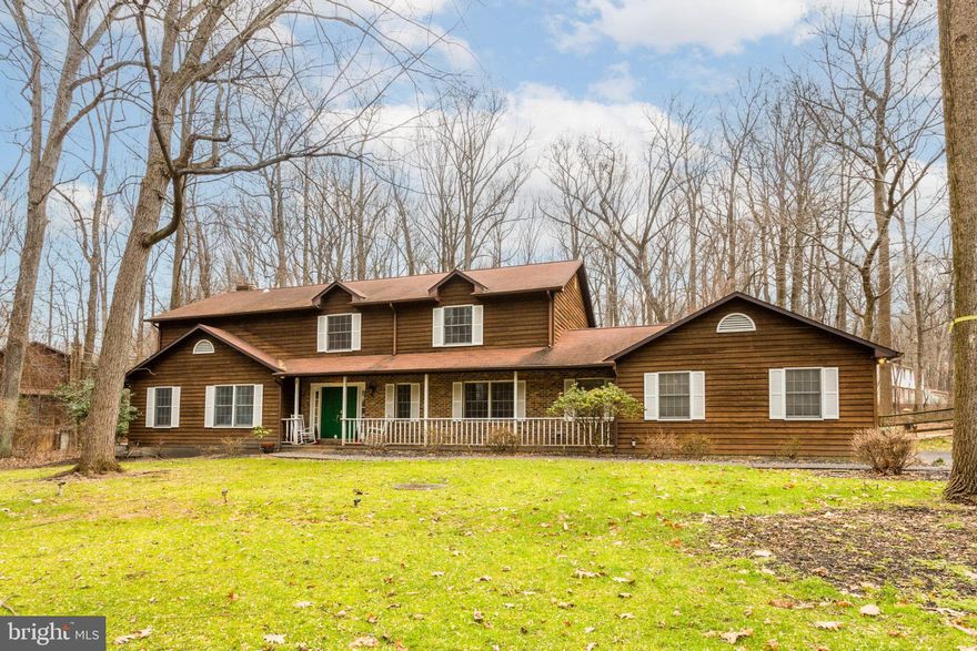 Wheelchair Accessible Ramp in Garage PLus Elevator On Main Level++++++Find your personal haven in this remarkable, elegant and distinctive home, on a premium corner lot with a backyard paradise that is secluded, private and quiet. Every room has been thoughtfully designed to feel warm and exceptionally inviting. Cross the threshold to admire the 2-Story Foyer with a bright, open floorplan and impressive finishes at every turn. The Main-Level features a Formal Dining Room, Living Room and Study w/ built-in shelving, each with gleaming hardwood floors.  The Living Room opens to the Sunken Family Room with dimensional carpeting, Gas Fireplace surrounded with built-ins, Wet Bar, Elevator and access to the rear deck. Also on this level is a Gourmet Kitchen with a Window-Lined Breakfast Room & Breakfast Bar, Granite Countertops,  rich and ample cabinetry, Greenhouse Window and Stainless Steel Appliances. The Kitchen opens to a sun drenched sunroom with a built-in wall unit, interior access to the 2 car garage w/ a wheelchair ramp and Laundry Room. The Upper-Level sleeping quarters boasts an enormous Primary Suite with cozy 2 sided gas fireplace, 10x8 organized walk-in closet and Luxury En-Suite Bath with granite topped dual vanities, glass enclosed large shower and double sided gas fireplace. Additionally on this level are 3 more generously sized Bedrooms and a hallway Full Bathroom. The sprawling Lower-Level is ideal for an Au Pair Suite offering a Bedroom, Full Bath, Great Room, Exercise Room, Game Room and Luxury Vinyl Plank Flooring. Walkout to your own personal backyard retreat, complete with a palatial fenced in pool, huge deck, lawn with extensive hardscape and picturesque tree-lined views and mature landscaping. The pool is a Heated In-Ground Salt Water Tsunami Pool with Tsunami Auto Self Cleaning System, Aqua Pour Salt Water System,  complete with Pool Equipment, Pool Cover and stone retaining walls. This turn key ready  home delivers a secluded atmosphere just minutes from shops, stores, dining, and major interstates, truly a place to call home! Do not hesitate...this stunning home and all of its fine features will sell fast! Schedule your Showing Today!