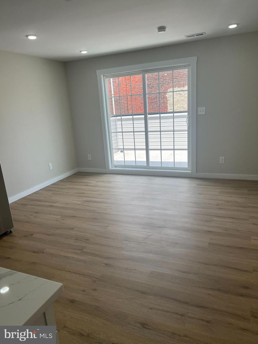 Come check out this newly renovated one-bedroom apartment with an outdoor deck area.  The property features all-new vinyl flooring, white shaker cabinets, stainless steel appliances, and central AC & heat.   The unit is also equipped with a laundry hook-up for your convenience.