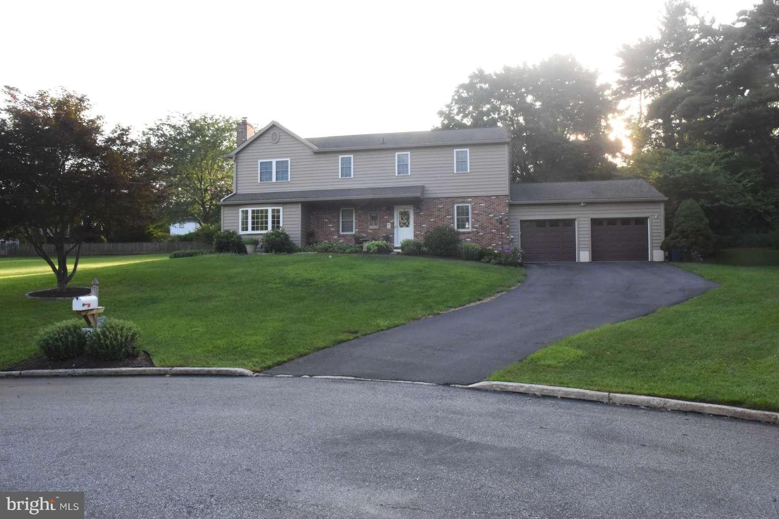 Welcome to 1215 Brinton Circle, West Chester! A beautifully updated home that sits on 0.68 acres in a quiet cul-de-sac with no HOA. Just minutes from downtown West Chester, 30 min from Lancaster & PHL airport. Inside you'll find beautiful hardwood floors throughout and a fully updated kitchen with a very large island perfect for all your entertaining needs, with a breakfast nook. Next is a large dining room with a brick fireplace with a newer wood stove insert. Moving into the family room where you'll find plenty of windows to enjoy the view of your private back yard and a heated floor for comfort in the chilly months. The walk in laundry room just off the kitchen makes for easy convenience and the living room is another large room with extra space for large gatherings. Upstairs are 5 bedrooms with hardwood flooring. The master bedroom has plenty of space along with 2 closets, one being a walk-in. The master bathroom features a 6ft oversized soaker tub and both the bathroom and walk-in closet have pocket doors. The other 4 bedrooms each have their own closets and plenty of space. The hall bath has a full tub/shower and double sinks. Heading to the unfinished basement and you'll find 680 sq ft of endless possibilities. The oversized 2 car garage is fully insulated and just off the living room. Outside you'll find beautifully maintained flower beds with many varieties of flowers for your own personal enjoyment, a patio area to sit & enjoy all the beauty of the wooded Fernhill Lake Reservoir that borders the back stretch of property. You'll find your own personal potting shed for all your gardening needs, along with a large shed with garage door to house the mower & other tools, raised beds for vegetable gardening & a double compost bin are all found out back. Don't miss out on this rare opportunity to own your own piece of land with a beautiful home in West Chester.