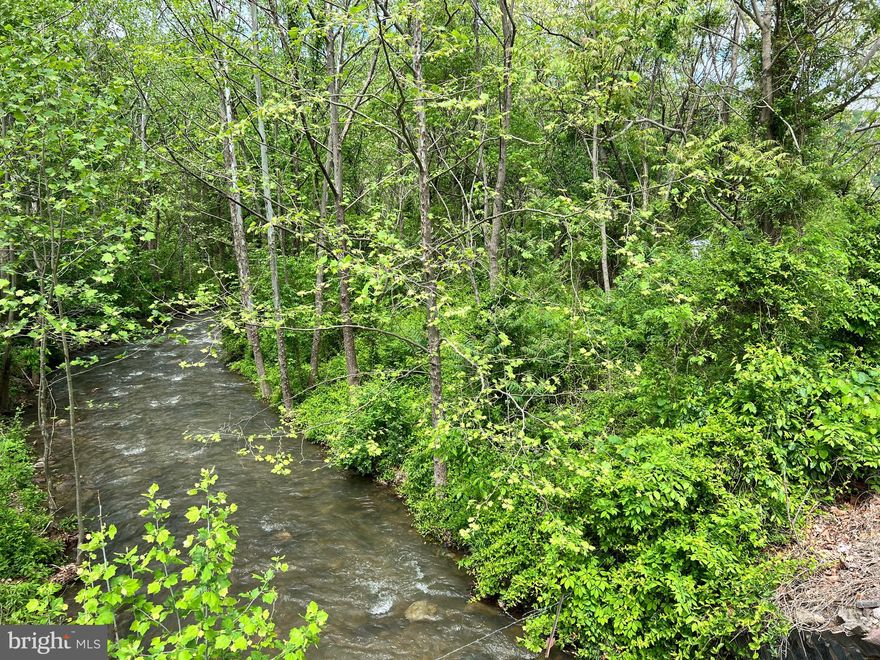 Great building site with view, stream and easy access,  this  3.5 acre unrestricted tract has lots of potential! Situate along South Fork Road and less than 5 miles from Moorefield, there is electric, fiber optic, public water and natural gas available. Perfect topography for build site and perfectly located out of town but less than ten minutes to town center.  Possibilities are endless for this old log landing/mill housing site.