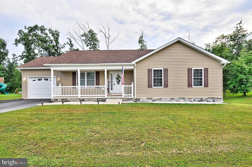 This immaculate 3-bedroom, 2-bath ranch home offers ample space and desirable features at an affordable price point. 
Key features
Relaxing Front Porch: Enjoy peaceful evenings on the large front porch.
Easy-Care Interiors: Features laminate flooring throughout for effortless maintenance.
Open Concept Living: The home boasts an open floor plan, seamlessly connecting the large living room, kitchen, and dining area.
Modern Kitchen: The kitchen is equipped with an island and stainless-steel appliances.
New Deck : The Patio doors in the dining room open to the large deck.
Comfortable Bedrooms: Three spacious bedrooms each offer ample closet space, large windows, and overhead lighting.
Updated Bathrooms: Both bathrooms include large single bowl vanities and easy-care acrylic tub/showers.
Convenient Laundry Room: The laundry room is already outfitted with a washer and dryer.
Private Master Suite: The master bedroom includes an en suite bathroom.
Attached Garage: Keep your vehicle protected in the attached garage with an automatic opener. Driveway is extra wide for your RV's of Vehicles.
Spacious Backyard: The large backyard is perfect for family and pets to enjoy outdoor activities. 
This home combines practicality and comfort, making it an excellent choice for those seeking a move-in ready ranch home with plenty of space and modern amenities.