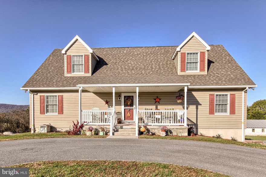 If you are looking for all of the amenities of a new home, as well as the country setting with plenty of land, this is the home for you! Gorgeous mountain views and overlooking views of Opossum Lake are just two of the many features that this home has to offer! With plenty of space for everyone, spread out in one of the five spacious bedrooms which includes two master suites, or curl up in the living room and watch the wildlife venture through your back yard. Full walkout basement could be finished for additional living space, and a fully drywalled oversized two car garage offers space and storage! Enjoy the large front porch for morning sunrises, or the rear deck for evening sunsets. With so many wonderful amenities, do not miss out on making it your own!