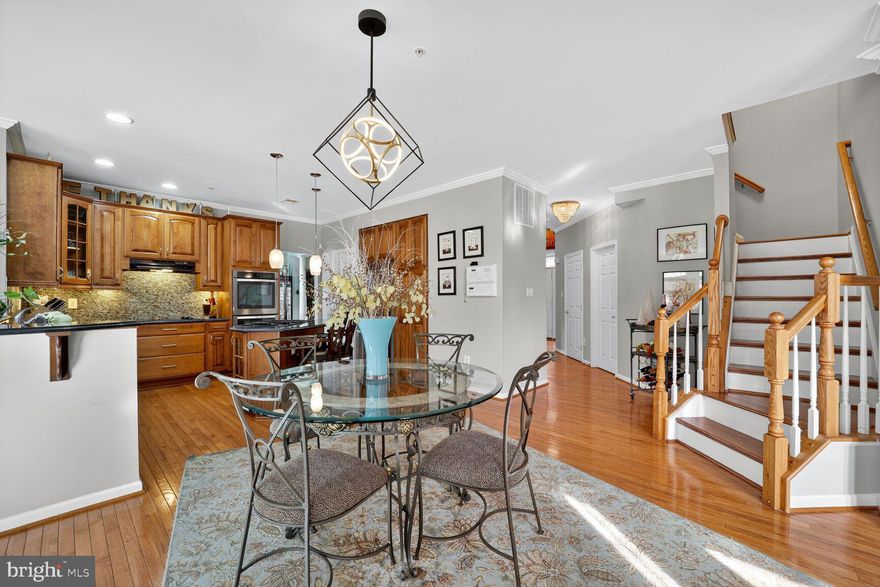 This Lovingly Cared for Colonial Home is artfully decorated and radiates warmth, creativity, and joy. You will enjoy an inviting eclectic style that celebrates life, beauty, and the memories shared.  This wonderful place to call Home is a gathering comfort for friends and family were happiness and love transcends. Create your lifetime of  memories in this captivating home with a two-story foyer that hosts a gorgeous, motorized chandalier that does convey. This home is wired with a sound system and has a built in intercom system. The main level has formal spaces with crown molding and includes an office, family room, open kitchen, morning room and dual staircases. The morning room flows to the outdoors, relaxing deck and screened-in Gazebo. The backyard get-away also features a  spacious, stone patio. The kitchen offers granite, plenty of seating, pendant lighting, beautiful cabnetry and storage galore. The interior of this home features, hardwood floors, well-maintained, that flow throughout the main level, stairway and upstairs hallway. The secondary bedrooms are nicely appointed. The primary suite is a very generous Oasis, it features a sitting area, tray ceiling, dual walk-in closets and en suite with separate shower, a jetted tub and dual vanities. The lower level is finished and ready for your entertainment dreams, with a movie room, den and large open recreational room... Come see and consider this Lovely Home... Call today!