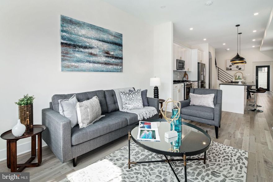 Amazing custom renovated CORNER home that runs street to street at a cherry spot in the Passyunk Square area of the city with roof deck approval in hand! This is a bright and large three-story corner home with three bedrooms and 3.5 bathrooms, full laundry room on the second floor, mud room at the back entrance, custom kitchen, and luxury finishes throughout. The third floor master suite has a walk-in closet and huge private five piece bath with double vanity in large glass walk-in shower. Every room in the house has tons of natural light from the front, rear, and side wall windows. The designer kitchen boasts gorgeous leathered granite countertops, tile backsplash, stainless steel appliance package with slide in range and large islands for entertaining. Soaring ceilings make this home feel enormous. Finished basement provides lots of extra bonus square footage and is perfect for an office, den, play room, theater room, etc. Located a half block from Broad Street and walking distance to several green parks and of course the best dining in Philadelphia on Passyunk Avenue. Custom renovated top to bottom, and one of the only corner homes on the market. All square footage numbers are approximate and include above and below grade square footage. Square footage should be verified by the buyer. It is the responsibility of the buyer to verify real estate taxes.