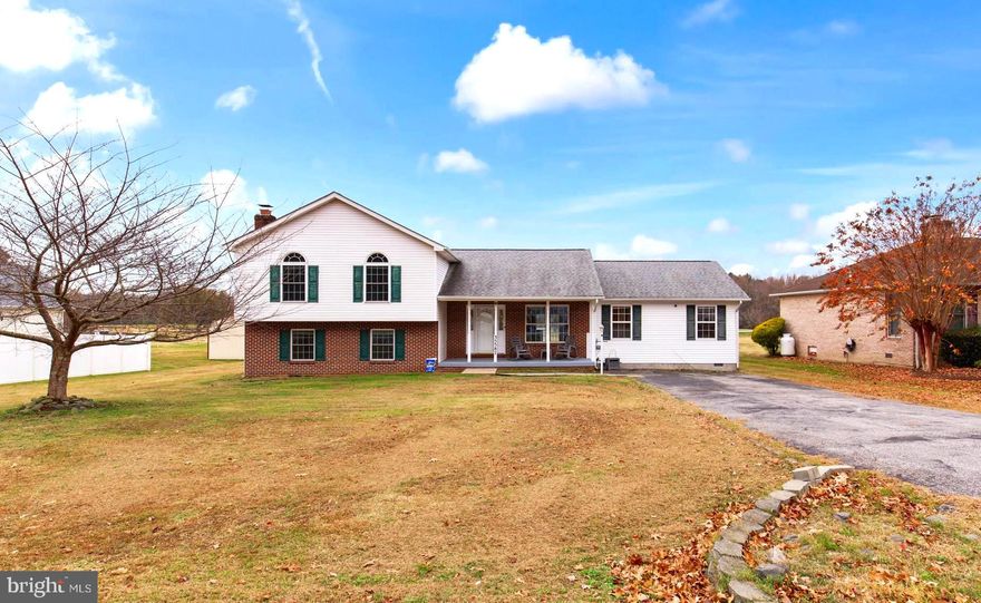 Enjoy the view from the 16th fairway in this beautiful home located in Wicomico Shores. Modern open kitchen concept with granite countertops and maple cabinets. This 4 Bedroom 3 bath home is spacious and inviting. You'll love the large deck that is partially screened plus access to the private above ground pool. The Community landing has its own picnic area, playground and boat ramp. Make your showing appointment today!