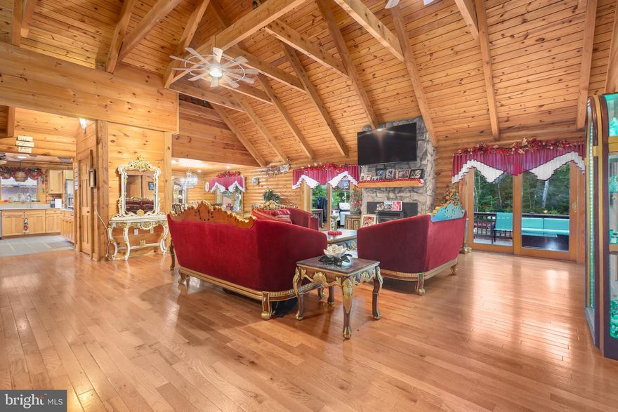 Discover a private escape in this extraordinarily updated 4- bedroom, 2.5 bath home set on nearly 5 acres of serene wooded land. Property features  separate In-Law Suite complete with two bedrooms and one bath. Built in 2003, and offering over 4,000 square feet of thoughtfully designed living space, this property combines modern comfort with timeless charm.  Step inside to a grand foyer and a cozy fireplace that sets the tone for relaxed living. The versatile layout includes a newly added, detached in-law suite, ideal for multigenerational living, guest accommodations or a spacious home office. A 2019 HVAC system ensures year-round efficiency and comfort. Outdoors, enjoy the pool with built-on deck, boasting resort style recreation.  Enjoy the beauty of your private acreage, ideal for gardening, exploring or simply unwinding in your own sanctuary. The possibilities are endless. Priced at $730,000 (approx. $179/sq. ft.),this home offers amazing value compared to similar properties in the area. Whether you seek country quiet, flexible living space or room to grow, this home is perfect. Conveniently located in Locust Grove-rural charm with accessibility to town amenities. 

Contact Owner, Perry Hooks,  for all inquiries, information and showings.

HVAC updated 2019
Hot Water Tank replaced 2012
Separate In-Law Suite 2022
Roof - 2016