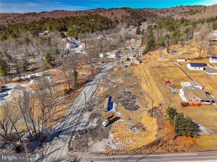 Great Commercial or Residential Opportunity to develop this prime 1.32 acre lot located just outside of downtown Palmerton, Lower Towamensing Township. Zoned VC (Village Center); Light Commercial-Residential District offers the perfect location for Single, Semi-detached, town homes, municipal use, hotel or motel, boarding or lodging home, business, professional or governmental office, mini-mall, professional center, convenience store, and/or warehouse, These two parcels (29C-33-26 & 29C-33-27) combined total the 1.3179 acres (resent survey attached in docs) are located on two heavily traveled streets in the neighborhood of Palmerton. During the seller's ownership, this previously wooded lot, was cleared, the seller started the process of combining both lots into one parcel, however since the seller has decided to sell the parcel, he has not completed the land development plan to submit for approval by zoning officer. Feel free to reach out to Lower Towamensing zoning officer to discuss for detail information and requirements to meet your plan for the parcel in order to file a land development plan to obtain property permits for use. SELLER IS MOTIVATED AND WILL ACCEPT AND REVIEW ALL REASONABLE OFFERS. Please call listing agent with any questions.