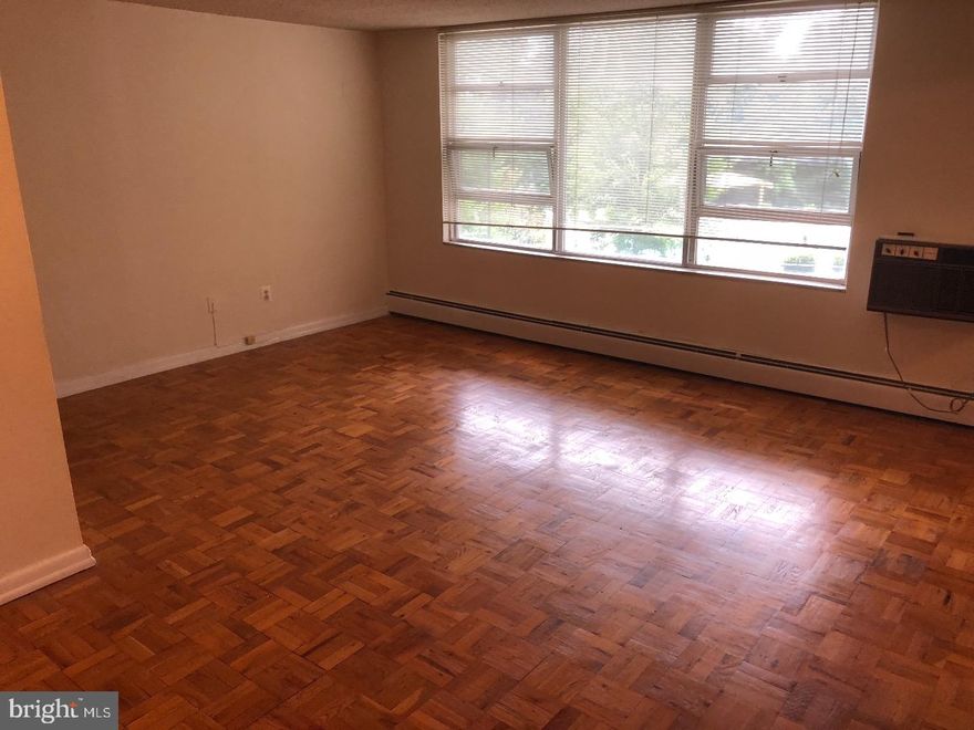 This terrific unit is overlooking the pool at Radnor House.  Easy for quick trips in and out of the building, choose to go up one flight of steps or take the elevator.  Hardwood floors throughout, updated unit with nice touches.  Radnor House features security at the front desk and a beautiful pool, ample parking and close to the train, Villanova, Rosemont, shops, restaurants and more. Radnor Township - excellent school district.  Must tour!