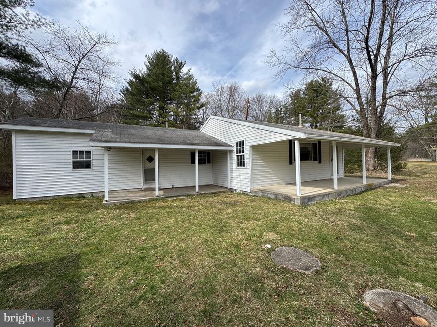 This charming home is the perfect getaway or can be used as a full-time residence. There is electric service, private well and septic, and propane heat. There are loads of updates, a large addition, vinyl siding, updated kitchen cabinets and new flooring was just added. You will love the peaceful setting with beautiful mountain views. There is small stream that cuts through the property and Honey Creek is just across the street. The property is Not in a flood zone. Located just 5 miles from Reeds Gap State Park offering beautiful hiking trails, pavilions and even a playground. The Famous Wilderness Lodge, bar & restaurant, are conveniently located just a short stroll down the road. Call today to schedule your private showing.