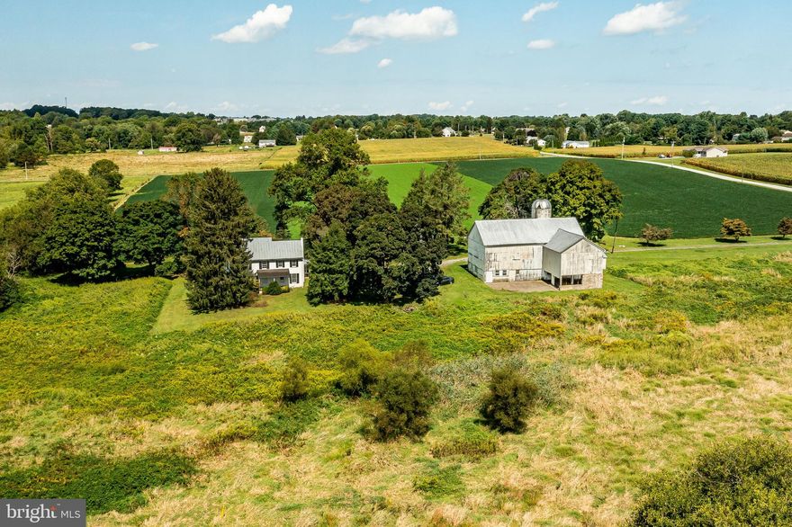 Coming soon, showings to begin November 3rd...Set on approximately 32 acres off a quiet country road and privately located down a long lane, sits this four bedroom, two and a half bath antique home that offers a special opportunity to create a fabulous equestrian farm or a superior gentleman’s estate. The gracious, light-filled home features generously sized rooms and period details throughout. The oldest section of the home dates to the mid-1700s with a mid-1800s section and a still later Kitchen and Family Room/Office addition dating from the 20th century. The large Living Room features an original fireplace with a period mantel. The adjoining Dining Room is conveniently located just off the Kitchen, with its plentiful counter space and bay windows. The south facing covered porch is a perfect location to relax and enjoy the farm’s bucolic vistas across protected meadows. Upstairs, all four bedrooms each have several windows, large closets, and original wood flooring. There are two full bathrooms. The two bay Garage has a large storage area on the second level that could be converted to a Home Office or other use. The large bank-barn features a spacious loft with post and peg construction and a lower level, once used for the farm’s dairy operation. Well priced and adjoining preserved farmland, this 3-parcel property offers a wonderful opportunity to live the epitome of a country lifestyle. Parcels included in sale: 58-6-2, 58-6-2.2, 71-2-14.1. See agent for details about pending subdivision, existing Wetlands Reserve Program Easement, and opportunity for an Agricultural Conservation Easement with the Chester County Agricultural Land Preservation Program.