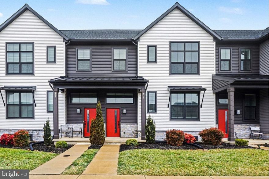 Buy with added confidence—this home includes a 2-year Buyer’s SUPREME Home Warranty plan from America’s Preferred Home Warranty, helping protect against unexpected repair costs on covered items during your first 2 years of ownership. (Coverage details, limits, and exclusions apply.)

Welcome to this beautifully maintained, like-new townhome in Madison Court, ideally located in the heart of Mechanicsburg Borough. Offering 3 bedrooms, 2.5 bathrooms, and 1,856 square feet of living space, this home blends modern style with everyday comfort.

The main level features an open-concept layout with durable vinyl plank flooring throughout the living, dining, and kitchen areas—perfect for entertaining or daily living. The kitchen is a standout with quartz countertops, tile backsplash, stainless steel appliances, a large center island, and pantry storage. Just off the rear-entry one-car garage, enjoy easy access and a private patio for outdoor relaxation.

Upstairs, you’ll find all three bedrooms, two full baths, and a conveniently located laundry room. The spacious owner’s suite includes a large walk-in closet and private bath with a double vanity and stall shower. A full, unfinished basement offers plenty of storage and future finishing potential. Custom blinds are included throughout both levels.

Located within the growing Legacy Park community, Madison Court is designed for connection and convenience with planned walking trails, green space, retail, and more. A 1 minute walk to the Market Square including Wolf Brewing Co, Luna Italian Cuisine, Down To Earth Cafe & MORE.  Just minutes from Route 114 and major commuter routes. Move-in ready, quick possession available, don’t miss your opportunity to make it yours!