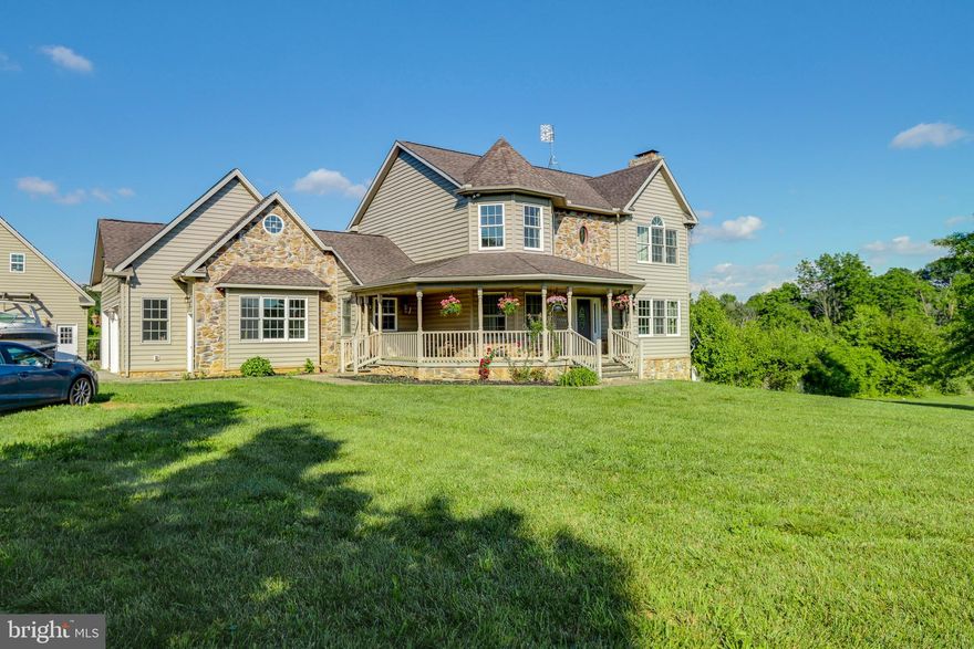 Picture this: 27+ acres, a barn big enough for you to follow your equestrian dreams, a 4-car drive-through detached garage, and a 2 car attached garage! This property has tons of potential for the buyer with discerning taste! Whether you love horses, antique cars, mechanics, or have a special hobby, you must see this property!  The huge 2 story Barn supports itself with solar energy and running water & currently has 2 stalls with room for 3 more, all with exterior doors for easy access to the pasture. A second-floor adds plenty of workspace, storage or room for additional supplies. The 4-car detached garage has 2 bays with drive-thru access & is solar-powered, perfect for housing farm equipment or for car enthusiasts. A beautiful tree-lined driveway leads to the freshly painted country home with gleaming wood floors and unmatched views of lush greenery and beautiful pastures. It offers over 2900+ sq. ft. with 3 large bedrooms and a master ensuite on the upper level. The main level offers a spacious eat-in kitchen with granite counters, a breakfast bar, stainless steel appliances, a custom backsplash & plenty of room to include an extra-large family table. Newer glass sliding doors provide easy access to a large deck, great for entertaining or just listening to the sounds of nature. Enjoy serving wonderful dinners in the formal dining room or quiet time sitting in front of the beautiful stacked stone fireplace. And of course, the attached 2 car garage with a separate entry door even has 2 EV electric vehicle charging stations! I almost forgot to mention the beautiful porch to watch mother nature at her best. Don’t miss this wonderful opportunity! (Seller offering $1500 for Microwave/Oven) FOR GPS LOCATION USE THE ADDRESS WITH WESTMINSTER AS TOWN