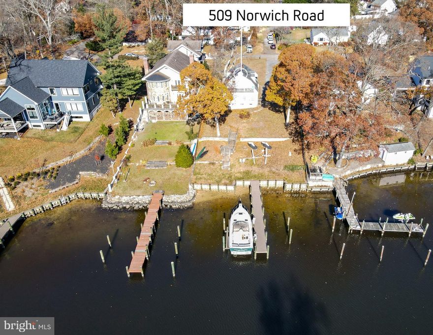 The hard work has been done! This amazing waterfront opportunity in Severna Park is a diamond in the rough.  All site work, county septic approval and county building approvals for a 3393 square foot house with 2 car garage are in hand. New bulkhead and deep water (5 feet MLW) 60 foot pier with a 15,000 lb electric lift with remote control are done. Bring your vision to this incredible location and create your waterfront dream. Located on Old Man Creek, you are minutes away by boat to The Point, Donnelley’s Dockside and much more. Enjoy days on the bay and evenings at your own waterfront retreat. Seller also has a proposed house plan in hand. Existing structure could be renovated or build your waterfront dream home. Use caution when going down to the pier. Buyer to verify all permits and documents with the county.