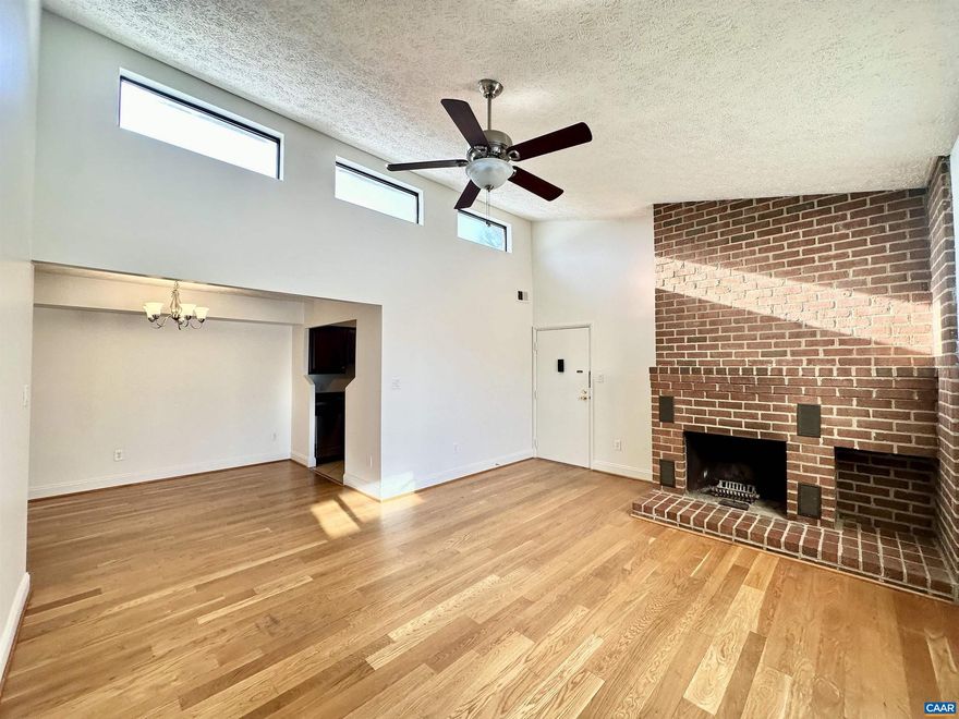 Beautifully renovated top-floor two bedroom condo. High vaulted ceilings let in lots of natural light. The condo was renovated to the highest quality with hardwood floors, cherry cabinets, stainless-steel appliances, and ceramic tile. The living room also features a wood-burning fireplace with an extensive brick hearth. The covered porch overlooking Turtle Creek is the perfect place to relax after a long day. There is abundant storage throughout the condo including walk-in closets in the bedrooms, a storage room off of the porch, a coat closet, a pantry, and a separate laundry room with a full-size washer/dryer. Kitchen features range, refrigerator, microwave, dishwasher, and garbage disposal.   Luxury condo living on Hydraulic Road, right next to the Shops at Stonefield! . Turtle Creek is an established community with all the amenities: 2 swimming pools, 2 tennis courts, playground, fitness room, clubroom, and walking trails. Per the HOA no pets are allowed.,Cherry Cabinets,Fireplace in Living Room