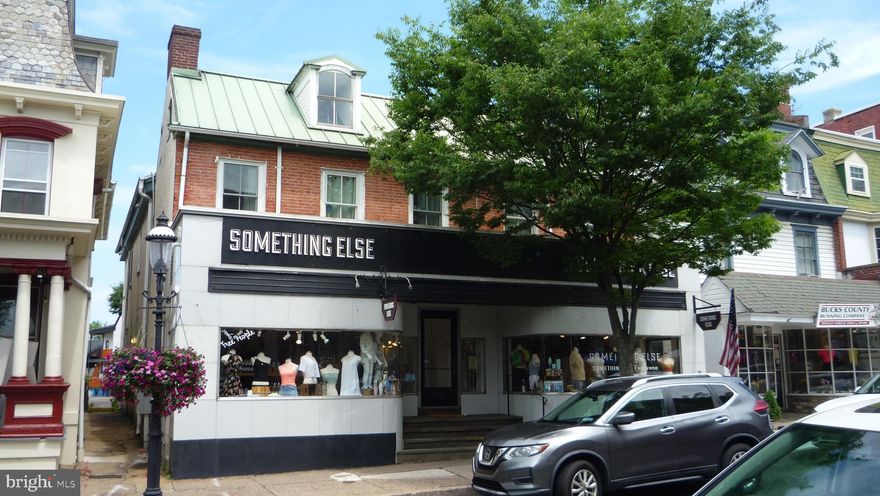 Superior investment in the center of Doylestown with 7 car off street parking fronting on W. Court St. Retail 1st floor, 2,884 sq. ft.  and 4 apartments above, 3 bedrooms and 1 studio, individual heat and air conditioning units in each apartment. Fully leased with annual income of $124,848.00, expenses $47,900.00, NOI $76,948, a cap rate of 6.1%