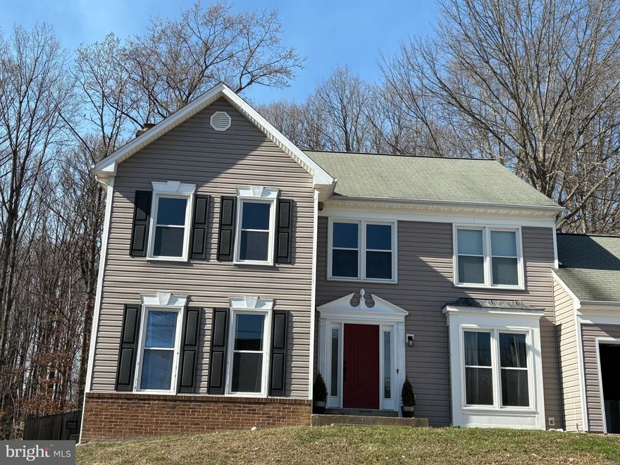 Come see this beautiful colonial home in the coveted Westwind Community with NO HOA!  The home backs up to a wooded area for serene views. The home boasts of over 3100 finished square feet. The traditional floor plan is designed for entertaining and is great for everyday living. The main floor has a beautiful two-floor entryway with a large dining room and formal living room.  The gourmet kitchen boasts of granite countertops and an attached breakfast room.  The family room has a cozy gas fireplace and flows seamlessly into the kitchen area.  Off the family room is an enormous deck with plenty of room for outdoor events and entertaining. Enjoy a morning coffee while relaxing in front of your beautiful view, or host large gatherings, this deck will do it all! 

The freshly carpeted upstairs has four spacious bedrooms. The primary bedroom is an enormous sanctuary and has a spacious primary bathroom that includes a soaking tub.  And, of course, there is a walk-in closet.

The freshly finished basement adds additional multi-use living space and includes a bonus room (NTC) that could be used as a private study or a guest room. Next to it is another full bathroom!

This location is ideal, as it is close to all kinds of shopping. A quick trip on nearby Prince William Parkway makes it minutes to I95 or commuter lots.

This is an unusually lovely home in a spectacular neighborhood for this low of a price!  Come put an offer on it before it is gone!