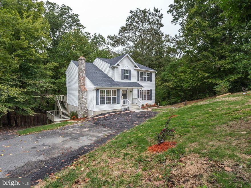 STUNNING RENOVATION!! THIS 4BR,3.5BA RARE FIND FEATURES THE FINEST IN DETAIL AND DESIGN**OVER 3,400 SQ FT**GLEAMING HW FLOORS, CUSTOM EAT-IN KITCHEN W/GRANITE COUNTERS, S/S APPLIANCES**AWESOME 2 LEVEL DECK W/SCREENED IN HOT TUB**FINISHED WALKOUT BASEMENT W/FULL BATH, LOCATED ON A QUIET CUL-DE-SAC. A MUST SEE!!