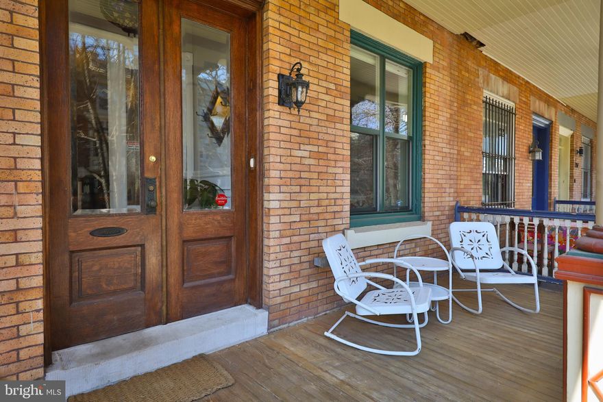 This sunny and spacious Spruce Hill/University City townhome in the Penn Alexander catchment was beautifully renovated, while preserving so much of the original details and charm. With five bedrooms, 3.5 bathrooms, a fully finished basement, and two great outdoor spaces, this home has it all! A classic West Philly front porch with solid wood double doors with leaded glass welcomes you into a gracious tiled foyer with ornate woodwork detail. The open concept first floor features hardwood floors, high ceilings, decorative tiled fireplace and mantle, and gorgeous staircase banister. The spacious dining area flows into a large, beautifully updated kitchen with a classic black countertop and breakfast bar, and white subway tile backsplash, gorgeous handcrafted oak pot rack, stainless steel appliances and white shaker cabinets with plenty of storage. Just beyond the kitchen, you'll find a conveniently located powder room and a mudroom with built-in shelving that opens onto a spacious private patio. Beyond the backyard to the right, a peaceful pocket park/bird sanctuary is directly accessible to neighbors on this block. The second floor is home to the spacious primary bedroom suite, huge walk-in closet, and a spacious spa-like ensuite bath with tiled floor, large soaking tub, and separate stall shower. On this floor you will find an additional bedroom (or a great office/den) with bay window. The third floor has an additional 3 bedrooms and a large and lovely updated hall bathroom with dual vanity. This floor is also home to the laundry closet. The finished basement has a full bathroom and roughly 600 square feet of additional space that can be used for a media room, exercise equipment, or guest space, plus a private corner nook that can be used as a cozy office, with additional storage space in the back. New roofs and all updated systems including dual-zoned central AC. This wonderful home is walkable to all the best that the neighborhood has to offer, including countless restaurants, coffee shops, shopping, Clark Park with its fabulous Farmers' Market and events, University City Swim Club, Mariposa Food Co-op, and so much more. Super convenient to HUP, CHOP, Penn, Drexel, University of the Sciences and about 10 minutes to Center City by car or bike with plenty of convenient SEPTA options. This area qualifies for both Penn and Drexel’s Home Ownership program grants for employees (confirm details directly with individual programs to see if you qualify). No expense was spared in designing and renovating this truly lovely home in a location that can't be beat. Schedule your showing today!