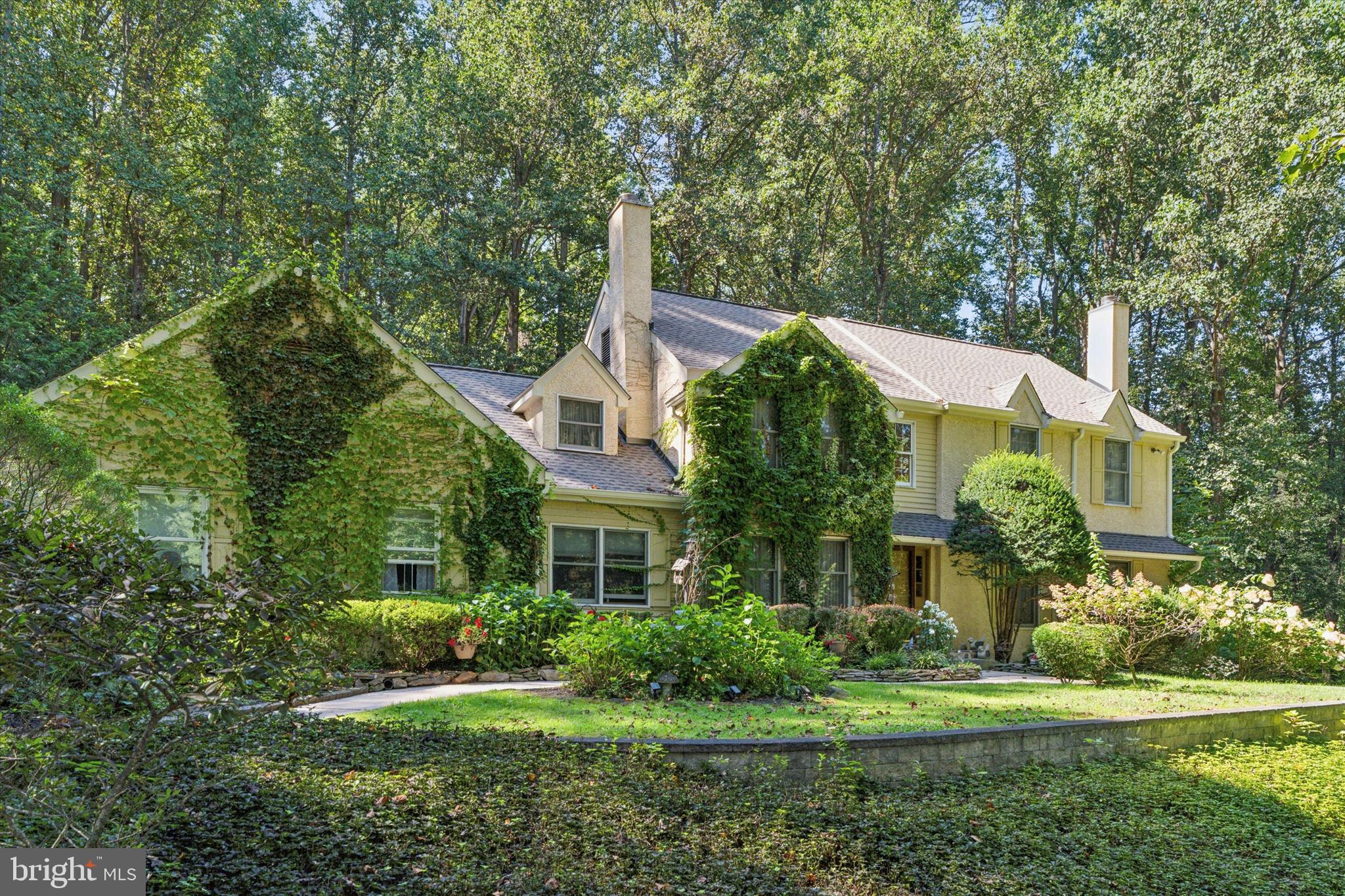 Truly Unique Home on Over 2 Acres! Set back on a long private driveway, this character-filled home offers space, privacy, and endless potential. With 5 bedrooms, 3 full baths, and a half bath, the layout is as versatile as it is inviting.
The main level offers three distinct sitting rooms—two greet you as you enter the home, one of which opens into a first-floor office, while the third sits off the kitchen and is flooded with natural light from walls of windows. The eat-in kitchen, generously sized, truly serves as the heart of the home. On the first floor, you’ll also find a convenient bedroom with its own full bath, plus a powder room for guests.
Upstairs, the primary suite features a private bath, while three additional bedrooms share a hall bath. Every bedroom is comfortably sized, giving everyone room to spread out.
Outside is where this property truly shines. A wraparound porch, spacious deck, and patio create multiple spots to relax or entertain. And yes, your own private heated pool for year-round enjoyment. For added peace of mind, the home also comes equipped with a whole-house backup generator.
This home is located in a wonderful setting and is waiting for its next owner to come in and make it their own. With its unique charm, ample square footage, and over two acres of land, the possibilities here are endless.