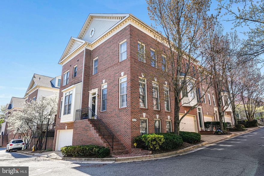 Welcome to The Serenity at Stonegate—a stunning end-unit colonial townhome offering over 2,400 square feet of elegant living space in one of Alexandria’s most sought-after communities. Perfectly positioned on charming Kirkpatrick Lane, this home blends thoughtful updates, spacious design, and sun-drenched interiors to create the ideal retreat just minutes from D.C.

Inside, you're greeted by a bright and airy main level with gleaming hardwood floors, oversized windows, and an open-concept living and dining space anchored by a cozy gas fireplace. The updated kitchen features newly installed wood flooring (2024), a commercial-grade gas stove (2024), a Bosch dishwasher (2024), and plenty of cabinet and prep space. A casual dining nook leads directly to the freshly refaced deck (2023)—ideal for outdoor entertaining or enjoying morning coffee.

Upstairs, the second level offers a true primary suite complete with a walk-in closet and a luxurious, fully renovated en-suite bath (2024) featuring a soaking tub and contemporary finishes. A second spacious bedroom and another newly renovated full bath (2024) complete this level. The third floor offers a private bedroom and full bathroom—perfect for guests, a home office, or a flexible bonus space.

The lower level includes a finished family room with hardwood flooring, access to the oversized 2-car attached garage, and rough-in plumbing for an additional bathroom. You'll also enjoy modern mechanical upgrades including a brand new furnace (2025), hot water heater (2025), washing machine (2025), and a new garage door (2025), giving you peace of mind for years to come.

Located in the quiet and friendly Stonegate community, you'll enjoy charming neighborhood appeal and unbeatable convenience—just minutes to Shirlington, Old Town Alexandria, I-395, and major commuter routes.

This is the one you’ve been waiting for: move-in ready, filled with natural light, and packed with high-end updates. Don’t miss your opportunity to own this exceptional home in Alexandria!