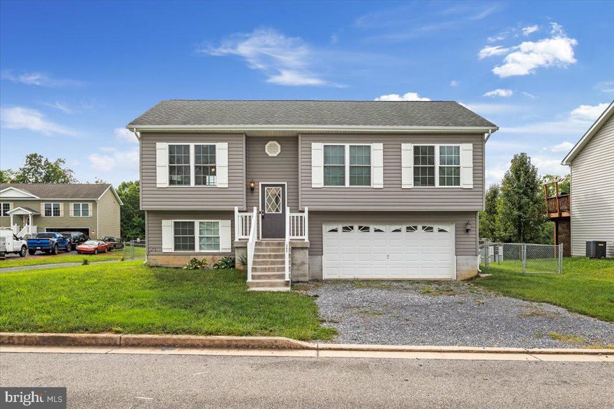 Fully Renovated 4 Bedroom , 3 bath split level home with Huge Fenced in Yard and 2 Car Garage! Main Level features 3 Bedrooms, 2 Full Baths, Open Floor plan, Gourmet Kitchen with Granite Countertops, Stainless Steel Appliances, Beautiful cabinets and brand new Luxury Vinyl Plank Flooring.  Lower Level features an In Law suite with Kitchenette, Full Bath and 2 car Garage. HUGE Fenced in Back Yard on a Cul-De-Sac. Move in Ready!