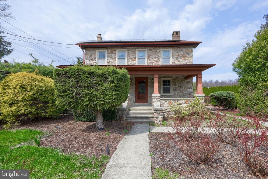 Settle your family into this extraordinary stone and log residence within the Oley school district. Spanning 3,224 square feet, the original part of the home was built in1860 and offers distinctive built-ins, deep window sills, and a walk-in fireplace anchoring the main family room. Picture yourself gathering with loved ones in a bright kitchen featuring an island, granite countertops, and 34 handle kitchen cabinets. The eat-in area connects to a spacious living room measuring 27 by 23 feet, which also houses a laundry room and one of three full bathrooms.
Upstairs, accessible via two staircases, you'll find five bedrooms and two full baths. There is an extra room perfect for use as an office or children's playroom. The master suite is large enough for a cozy sitting corner, with its bathroom boasting of a charming claw-foot bathtub. Throughout the second floor, numerous windows let in abundant natural light.
The basement stretches across the entire footprint of the house, and is divided into three sections. Entering from the stone portion of the hous, reveals a well pump, a newer oil burner for secondary heating, an above-ground oil tank, and a 200-amp electrical panel. Most of the space serves as storage, while the central section is ideal for household projects and includes a unique spring cellar. At the rear of the basement, there's a finished 21-by-21-foot entertainment room, along with two closets containing HVAC units for the geothermal system. Outdoor access to the basement is provided by a Bilko door and another entry from the side porch.
Situated on a 1.62-acre lot, the home features a covered porch at the front and side, a generous brick patio, hot tub, and a two-car garage, with the well found beside the garage. Mature trees, shrubs, and plenty of open space offer opportunities for gardening and outdoor gatherings, making this home both inviting and functional.