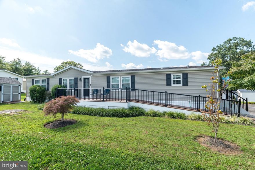 Carefree lifestyle awaits,  in this completely renovated three bedroom home.  Enter in to the family room with stone corner propane gas fireplace.    Kitchen has a large island, plenty of cabinets space  and stone counter tops. breakfast room has sliding glass doors leading to the side deck. Dining room is large for family gatherings,  New replacement windows, Two new bathrooms, New roof with two New skylights,  2 x 6 construction.  Multiple ceiling fans. Master bedroom has a new  MBR bathroom with double bowl sink and handicapped roll in wide shower.   There are two additional bedrooms and another  full hall bathroom.  Bedroom #2 is 14 x 13, and BR #3 is 14 x 9, and can be used as a bedroom or office.  All new luxury vinyl flooring through out.   This modular home is 26 feet by 64 feet, offering 1664 square feet of one level living.  Front porch deck to enjoy fresh air and outside space.  Storage shed is  8 x 8.  Off street parking.  Close to Rt. 309 with easy access to Quakertown and Montgomeryville.