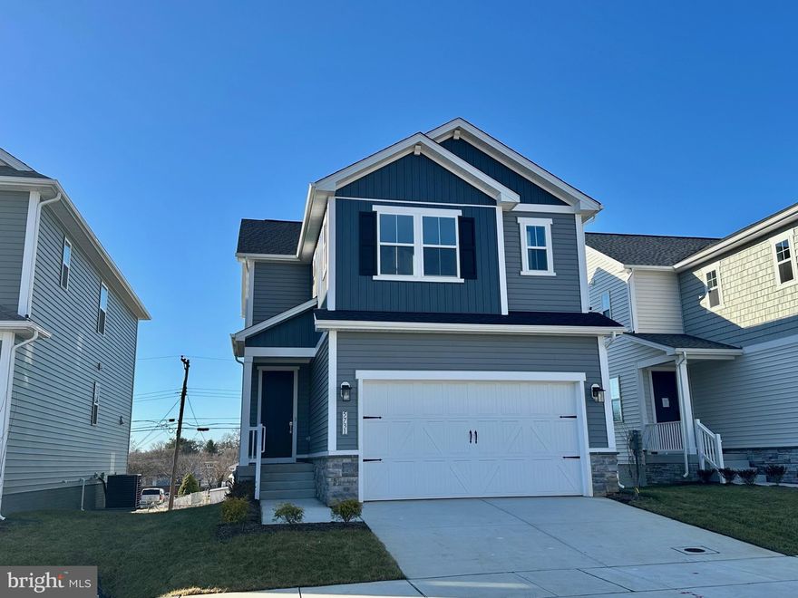 WITH RATES BELOW 5% YOU CAN OWN THIS NEW CONSTRUCTION MOVE-IN READY HOME FOR THE SAME P&I PAYMENT AS A $510,000 RESALE!! This brand-new 3-bedroom, 3 1/2 bath Lana by Richmond American Homes. The main floor of this charming Lana plan offers an inviting great room with Mohawk luxury vinyl plank floors on the main level, 9' ceilings with 8' doors, a powder room, electric fireplace, gourmet kitchen with a convenient island, quartz countertops, backsplash, pantry with wood shelves.  Upstairs, you’ll find three elegant bedrooms, including an impressive primary suite showcasing a roomy walk-in closet and a deluxe bath with double sinks. A secondary bath, top floor laundry, 2-garage with EV charging station, video doorbell, smart locks, sidewalks throughout the community, and a finished basement with 9' ceilings, rough-in for wet bar with a full bathroom complete this home. Enclave at Arundel Hills is an exciting new community in Glen Burnie. It offers easy access to major employers in Baltimore, Annapolis, and Washington D.C. via I-695 and I-97 and is located just minutes from Fort Meade. Residents can also appreciate close proximity to BWI, countless dining options and minutes to waterfront restaurants, and entertainment options. Choose from an attractive array of single-family homes, each boasting the designer details and in-demand features today’s homebuyers are seeking! Model is OPEN but visitors are encouraged to call ahead to be guaranteed a dedicated appointment.