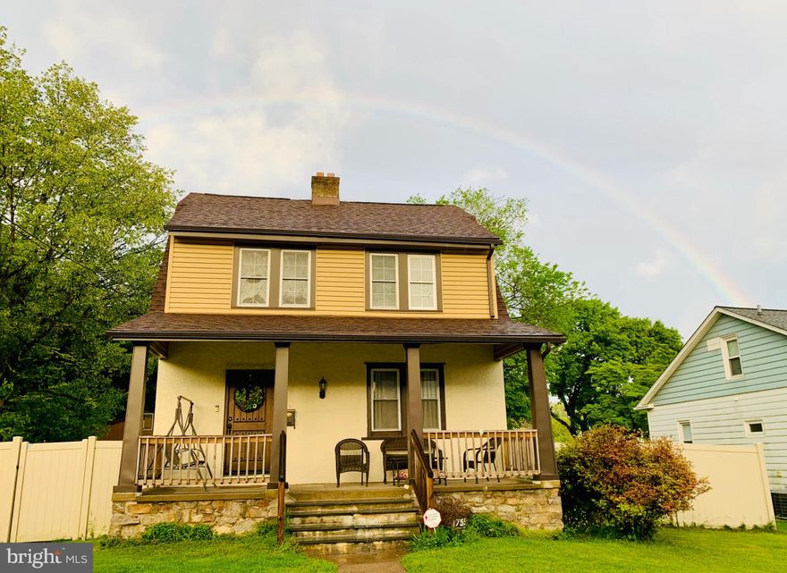 This beautifully maintained 1924 Colonial blends timeless character with quality upgrades completed over time. Situated on a quiet, tree-lined street in Abington, this classic stucco home showcases high ceilings, arched doorways, detailed millwork, deep-set windows, and hardwood flooring in the living room, preserving its original charm.

The inviting living room with marble-accented fireplace flows into a spacious eat-in kitchen featuring granite countertops, peninsula seating, center island, custom cabinetry, and stainless steel appliances — ideal for everyday living and entertaining.

Upstairs offers four bedrooms (some with carpeting), including a generously sized primary suite with sitting area and walk-in closet, along with an full bath featuring a frameless shower and Jacuzzi tub.

The finished basement adds even more flexibility with a full bath and a bonus room perfect for a home office, gym, guest space, or playroom.

Outdoor living is just as impressive with a raised deck overlooking the fenced yard, a dedicated storage shed, and a driveway leading to a detached two-car garage currently used as versatile recreation space.

A rare opportunity to own a character-filled home with space, storage, and flexibility.