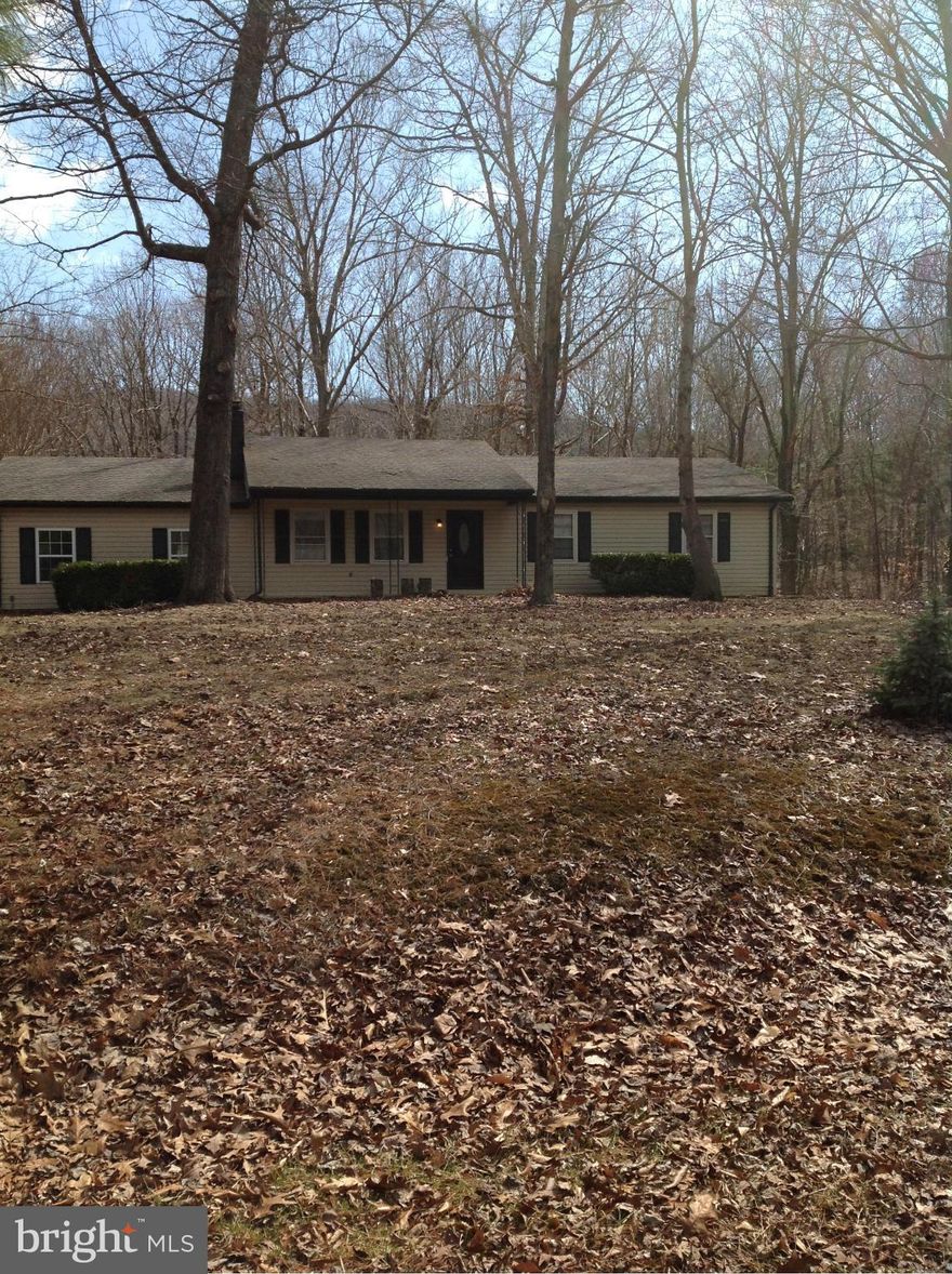 Wonderful single family home on five acres--private--Huge family room--three bedrooms two full baths--nice kitchenwasher/dryer--large wood stove in living room--carpet in bedrooms/family room and wood laminate flooring in kitchen and living room