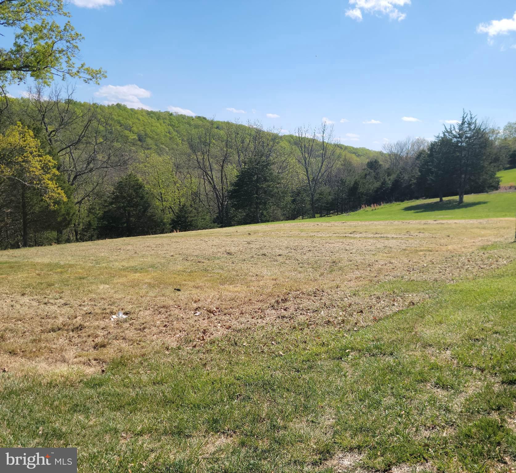 This listing provides an opportunity to purchase a building lot in the exclusive "The Point" subdivision. Lot 3 in Sec III has paved road frontage, is cleared, vacant and mowed. Public water and sewer are available. Enjoy mountain views in a quiet, established neighborhood but enjoy the conveniences of shopping, dining, schools, hospital and medical services. Vacant lots are limited.