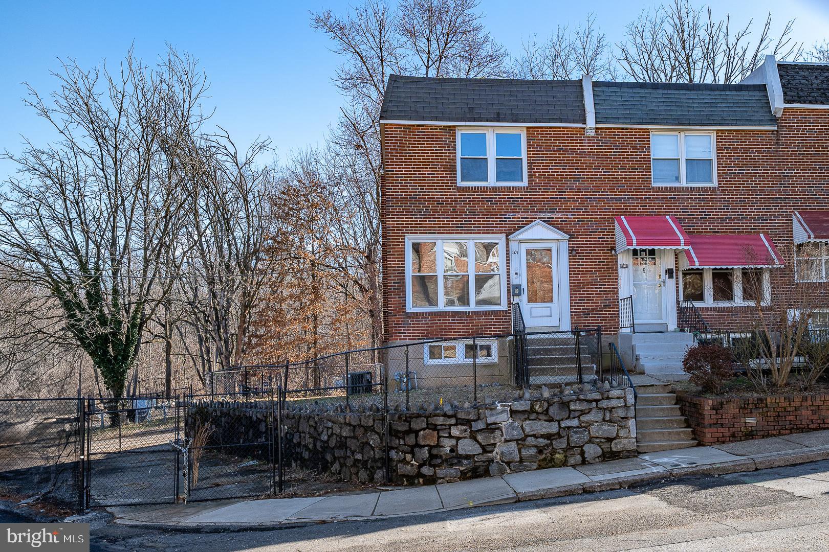 Affordable Luxury and Extraordinary Outdoor Space--A must see! Charming, renovated 3BR 1.5BA corner Row/Townhome is bathed in natural sunlight throughout the day, due to its Northwestern and Southern exposures. With a full-sized front picture window and windows on three sides, each floor is sun-drenched and enjoys park views. A modern eat-in kitchen features large cabinets, a quartz countertop, stainless steel appliances, microwave, dishwasher, disposal, goose-neck faucet and recessed lighting. Travel upstairs to 3 natural brightly lit bedrooms and a hall bathroom that is styled with imported tile, modern fixtures and a skylight. Enjoy the convenience of your personal washer and dryer and ample basement storage. Additional features include beautiful oak hardwood floors throughout, central A/C, and lots of closet space. A fenced attached yard and an oversized rear yard bordering Cobbs Creek Park provide great spaces for nature lovers, children and family gatherings. Nearby schools, parks, transportation, groceries, and shopping make this a great location! Private fenced parking for three vehicles is included.