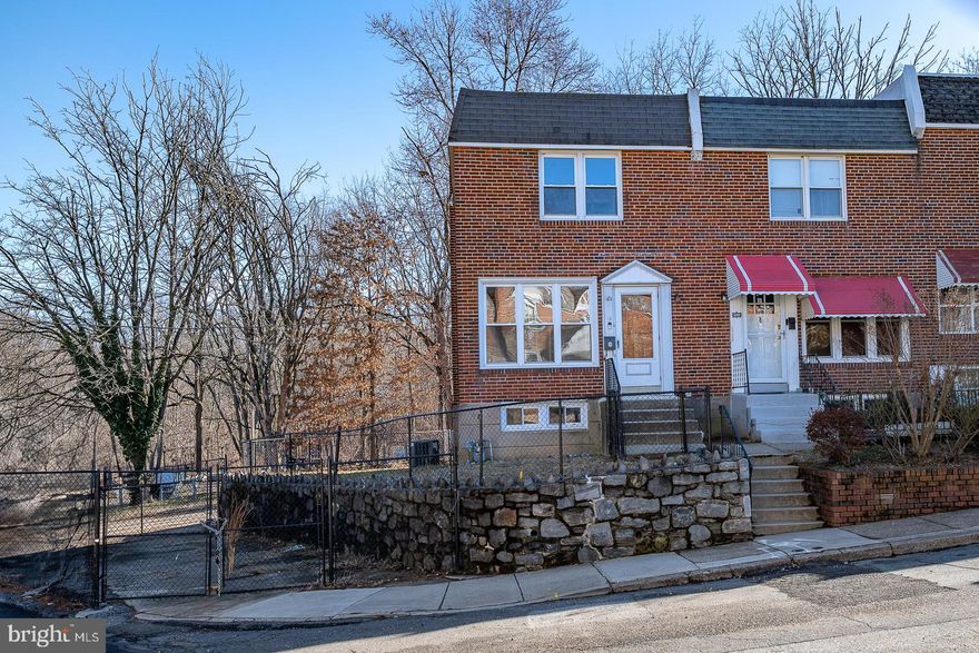 Affordable Luxury and Extraordinary Outdoor Space--A must see! Charming, renovated 3BR 1.5BA corner Row/Townhome is bathed in natural sunlight throughout the day, due to its Northwestern and Southern exposures. With a full-sized front picture window and windows on three sides, each floor is sun-drenched and enjoys park views. A modern eat-in kitchen features large cabinets, a quartz countertop, stainless steel appliances, microwave, dishwasher, disposal, goose-neck faucet and recessed lighting. Travel upstairs to 3 natural brightly lit bedrooms and a hall bathroom that is styled with imported tile, modern fixtures and a skylight. Enjoy the convenience of your personal washer and dryer and ample basement storage. Additional features include beautiful oak hardwood floors throughout, central A/C, and lots of closet space. A fenced attached yard and an oversized rear yard bordering Cobbs Creek Park provide great spaces for nature lovers, children and family gatherings. Nearby schools, parks, transportation, groceries, and shopping make this a great location! Private fenced parking for three vehicles is included.