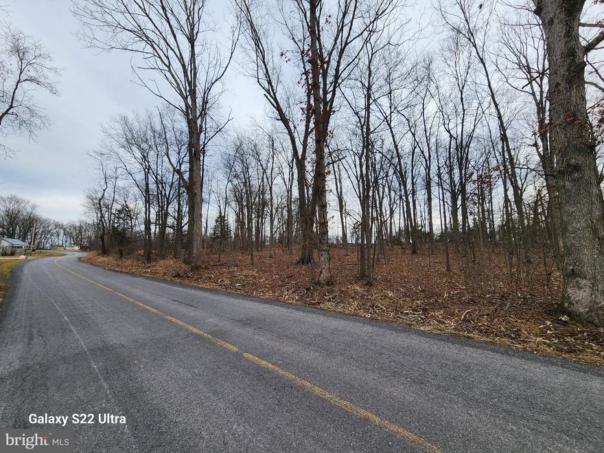 Build your dream home on this beautiful 1.84 acre wooded lot in Gettysburg PA. Wooded lot, on gorgeous rural road has approved septic option. Bring your builder of choice.