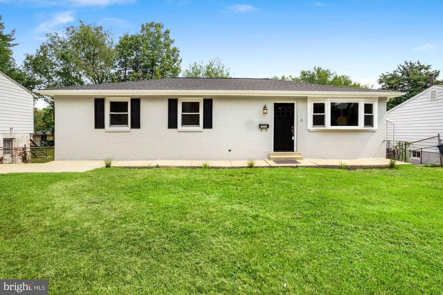 Completely renovated home with 4 bedrooms and 2 full baths and 1 half bath, freshly painted and ready to move-in! The main level featured 3 bedrooms and 2 full baths, a formal living and dining room, a spacious kitchen with granite countertop and newer stainless appliances. Spacious Master Bedroom with attached bathroom and walk-in closet. New architectural roof, new carpet/laminated flooring. This walkout basement having a large bedroom along with recreational area with half bath. Laundry in basement featured with newer washer and dryer. The Driveway carries two car parking spaces. Awesome location - 10 minutes walk to Grocery store, Shopping Mall and close to public transportation. Minutes away from 495, 20 minutes drive to Downtown DC, MGM Casino, National Harbor. Schedule your showing online!