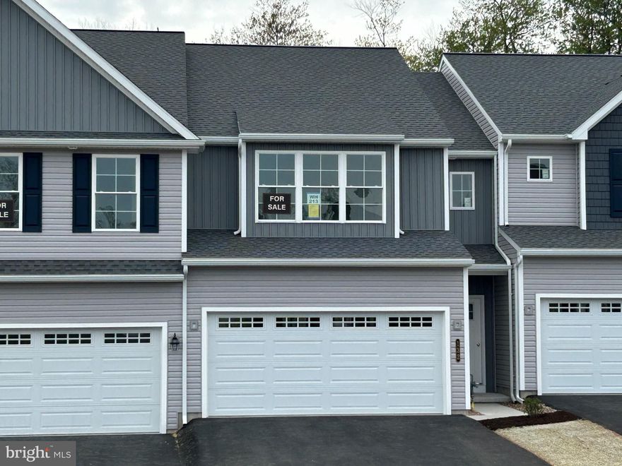 UNDER CONSTRUCTION. *$10,000 builder incentive; thru 4/30/26* 
This Swallow model is a 3 BD, 2.5 BA, 1,798 sq. feet, center-unit townhome. With its nine foot ceilings and lots of natural light, this home feels comfortably spacious. Included in this kitchen is an island, granite counters, stainless steel appliances, recessed lighting, an adjacent pantry and many more features. You will feel right at home in the owner’s suite with its ample space and lots of natural light which also features a private bath and walk-in closet. Also on the second floor are bedrooms two and three, a family bath and the laundry room, which is just steps from all bedrooms and bathrooms. This home has a full, unfinished, walkout lower level and a 2 car garage. A composite deck, as well as the patio below, affords additional outdoor living space. Interior selections may still be available.
All taxes are estimated since this is new construction and has not yet been assessed.
Interior photos are of a similar home.