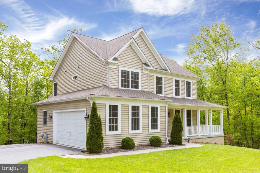 You do not want to miss this incredibly well maintained home! Only 5 years young! This gorgeous home is located in a cul-de-sac location with many upgrades which include gourmet kitchen, hardwood floors, open floor plan, cozy deck over looking the trees, fully finished lower level (walk out), side-loading 2 car garage and so much more! This beautiful wooded homesite is close to everything convenient!