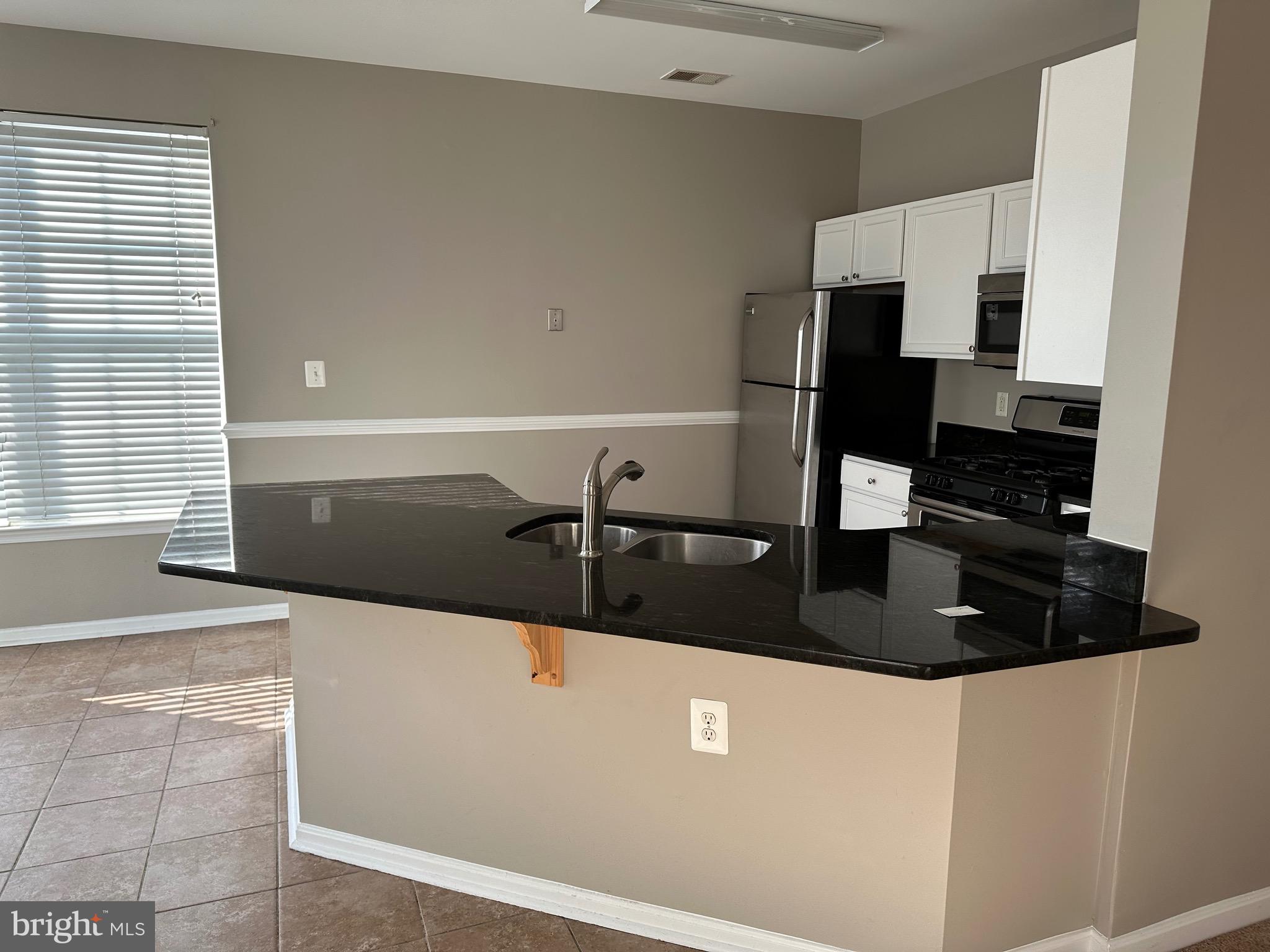 WOODLAND BOWIE CONDO - Residential