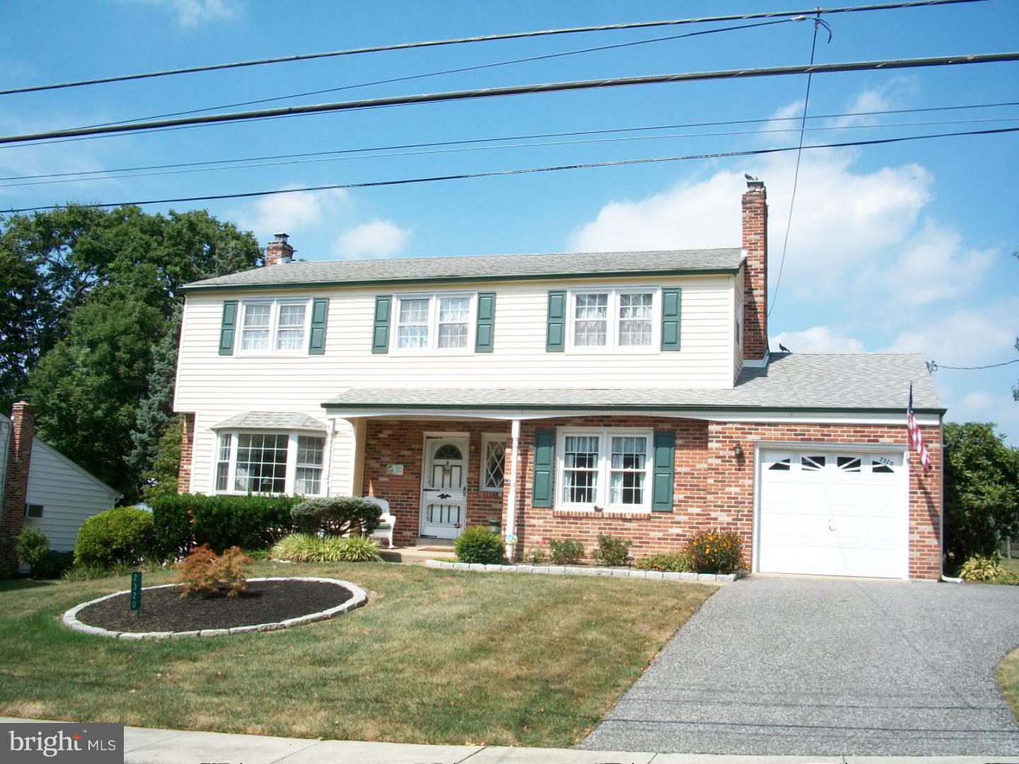 Welcome Home! Beautiful, well maintained 4 bedroom 2 1/2 Bath Colonial. Entrance Hall, Large living room w/Bay Window and Hardwood Floors. Dining room with chair rail, hardwood floors and French Doors to the Deck. Updated kitchen w/wood cabinets and Granit counters. Family Room w/Fireplace, large closet, tile floor and powder room. Laundry Room w/outside entrance. Second Floor: Spacious master bedroom w/large closet, new beautiful full bathroom. Three additional bedrooms, Hall bath, linen closet.  Full basement, garage, Great Deck and Patio. Large beautifully landscaped yard.