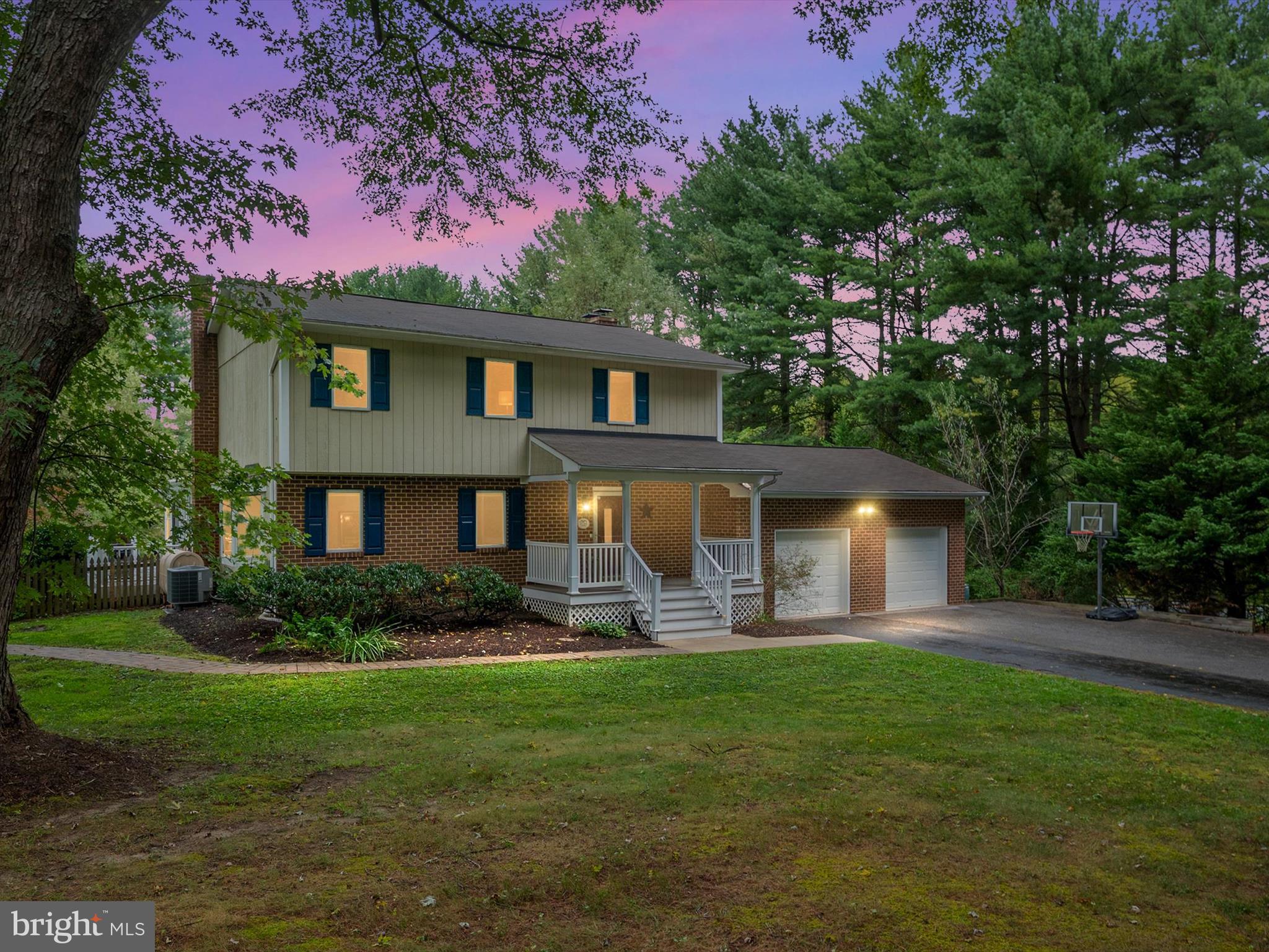 Welcome to a beautifully maintained 4-bedroom, 2.5-bath home on a picturesque one-acre lot in sought out Davidsonville. This classic home offers the perfect blend of timeless design, modern updates, and exceptional spaces for both everyday living and entertaining. The inviting main level is thoughtfully designed for comfort and flow. A spacious living room opens directly to the updated kitchen, creating the heart of the home. The kitchen features modern finishes, abundant cabinetry, and views of the backyard pool and lawn. Just off the living room, a four-season sunroom provides light-filled additional living space, perfect for morning coffee or year-round relaxation. A separate dining room is ideal for hosting gatherings, while a cozy gathering room with a fireplace offers the perfect spot to unwind on cooler evenings. A convenient half bath and access to the two car garage completes this level. Upstairs, you’ll find four generously sized bedrooms, including a serene primary suite with a beautifully updated en-suite bath. An additional full bath serves the remaining bedrooms, making the upper level ideal for family and guests alike. The finished lower level expands your living space with a large recreation room and pool table. There is also ample unfinished storage space, with plenty of room for a gym. Step outside to your own backyard retreat: a sparkling in-ground pool, expansive patio, outdoor tv area, and lush lawn ideal for gatherings and endless opportunities for outdoor fun. The property’s sprawling setting offers both privacy and room to play, while still being close to major commuter routes, shopping and dining. With its blend of updates, space, and a premier location, 2744 Swann Way is a must-see opportunity to own a slice of Davidsonville living.