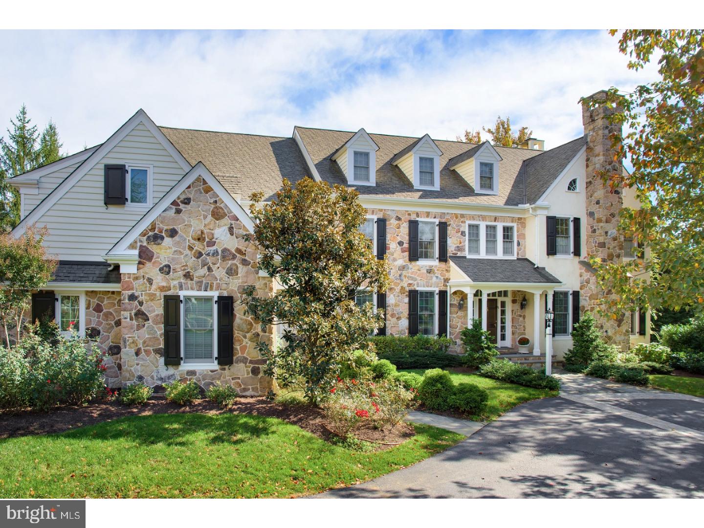 Quality constructed by Pohlig Builders, this exquisite estate in a quiet, double cul-de-sac neighborhood offers breathtaking grounds & preservation area views. No through traffic ensures peace of mind when the family goes out to play. The Harriton Farm development of 30 stately homes is conducive to family living with beautiful walking trails that wind through the wooded preservation area, as well as common area that makes a perfect open playing field! If entertaining is your desire, this home has a wonderful layout along with spectacular outdoor areas that include a private swimming pool/spa & outdoor deck with hot tub. With 2 stories & a lower level, there is plenty of room to gather or spread out. A grand Reception Hall with a flared staircase spills into elegant living & dining rooms through large openings with random width oak flooring throughout. Enter the library with built-in bookcases & a gas fireplace through French doors from the living room & hall. Serving the wainscoted dining room is a butler's pantry with white cabinetry & honed granite counter. The kitchen, breakfast room & family room area has been designed with extra square footage for family comfort. The gourmet Kountry Kraft kitchen with a center island, tumbled marble backsplash, walk-in pantry & top-name stainless steel appliances will inspire creativity. Savor stunning scenery in the vaulted breakfast room with windows on 3 exposures that opens to the multi-tiered deck with hot tub. Relax in the step-down family room with high coffered ceilings, a floor-to-ceiling stone gas fireplace & adjacent workstation area with cabinetry. A mudroom accesses a powder room, closet, family entrance & attached 3-car garage. The bedroom level offers quiet accommodations for family & guests. Your master suite situated privately through double doors presents a dressing area, 2 fitted walk-in closets & luxurious bath with his/hers vanities, heated floors, Jacuzzi, oversized rain shower & water closet. Two more BR suites & 2 bedrooms sharing a bath occupy this level, as does a laundry room. An open area can be used as a sitting room or computer station. The unfinished third level is excellent for storage. There's something for everyone in the finished day-lit lower level with an exercise room, game/TV room, wet bar, billiards area, home theater, large bonus/rec room & powder room. This home also has new heaters/air conditioners & a state-of-the-art water filtration system.