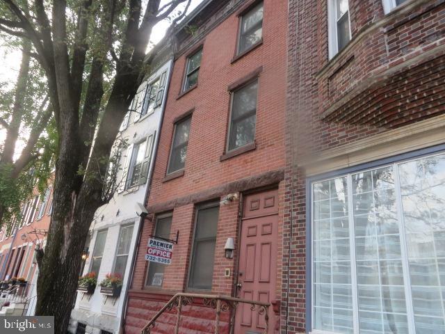Three story office building located just off of 17th and Pine Street and close to Rittenhouse Square. Approximately 2400 sq ft. of office on 3 floors. 1st floor reception area, common office space plus rear private office with bathroom and rear patio. 2nd floor conference room, rear private office, powder room, plus additional office space. Third floor has 3 private offices, common office space plus powder room. Attic allow for plenty of storage space . Full basement. Three zone heating and central air. Parking lot directly across from office or possible monthly parking space available.