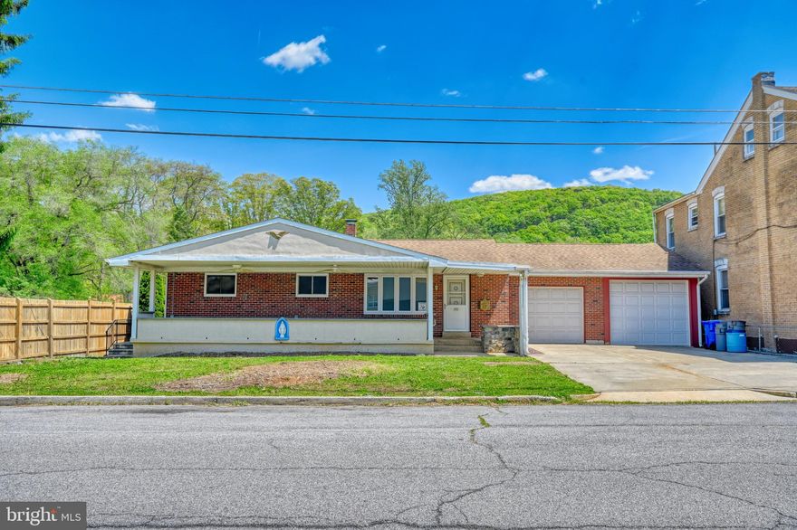 Brick Ranch home in the Reading School District with three Bedrooms and on Full Bath. You can relax on the huge front porch and even walk down to Victor Emmanuel's for a slice and a cold drink. There are hardwood floors throughout this home as well as several ceiling fans. The Kitchen has 19 handles and a gas range. The 2 car attached Garage so no need to park on the street. Out back you have a storage shed with a bay door as well as a spacious 19x28 2 story outbuilding which offers many possibilities. The 2 story building does have electric. The back yard has a privacy fence which offers peace of mind and security for your little ones and pets. You'll want to add your personal touch and cosmetic flair and make this house your home!