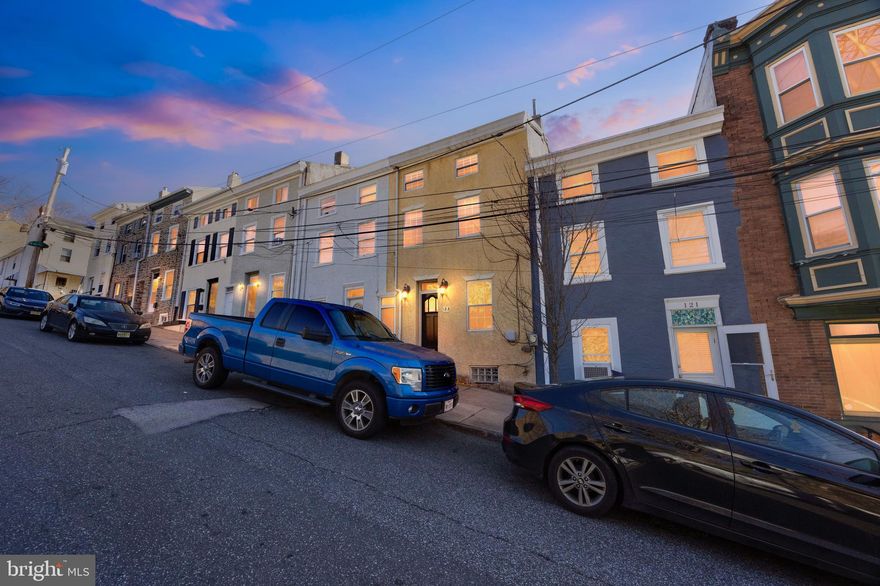 Welcome to 123 Pensdale Street, ideally located in the heart of Manayunk, just one block from Main Street’s popular restaurants, bars, shops, and public transportation. This beautifully updated three-story, three-bedroom townhome offers the perfect blend of charm, comfort, and convenience. Step inside to an open-concept living and dining area featuring refinished hardwood floors, recessed lighting, and multiple ceiling fans. The spacious, updated kitchen is designed to impress with Calacatta Alto quartz countertops, a classic subway tile backsplash, freshly painted cabinetry with sleek black hardware, a new sink, and newer appliances. From the kitchen, step out to a private rear patio—perfect for relaxing or entertaining. The second floor features a generously sized primary bedroom with a large closet, along with a full tiled hall bathroom. On the third floor, you’ll find two additional bedrooms, both with refinished hardwood floors. Additional highlights include central air conditioning, a full basement with washer and dryer, and ample storage space. Enjoy walkable access to the train station, public transportation, and everything Manayunk has to offer. Schedule your tour today and experience this exceptional home for yourself!