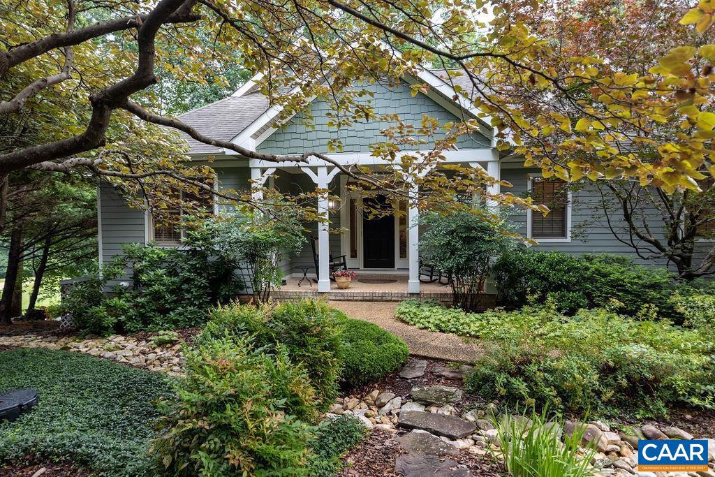 Tucked into a beautifully landscaped setting on a quiet lane, this home enjoys a shady perch overlooking the golf course and pond, with walking trails nearby. Open flowing floor plan with outstanding gourmet kitchen- lots of room to prep and entertain, 2 dishwashers, two ovens, lots of cabinets and counter space- truly a cook's delight! This home has been thoughtfully designed for main floor living and comfortable accommodations for guests on the bright terrace level. Even a sauna for comfort after a work out. Meticulously maintained, with recent exterior painting. HVAC, refrigerator, tankless hot water heater are recently upgraded. This is a luxury home in beautiful condition, ready for a new owner.,Granite Counter