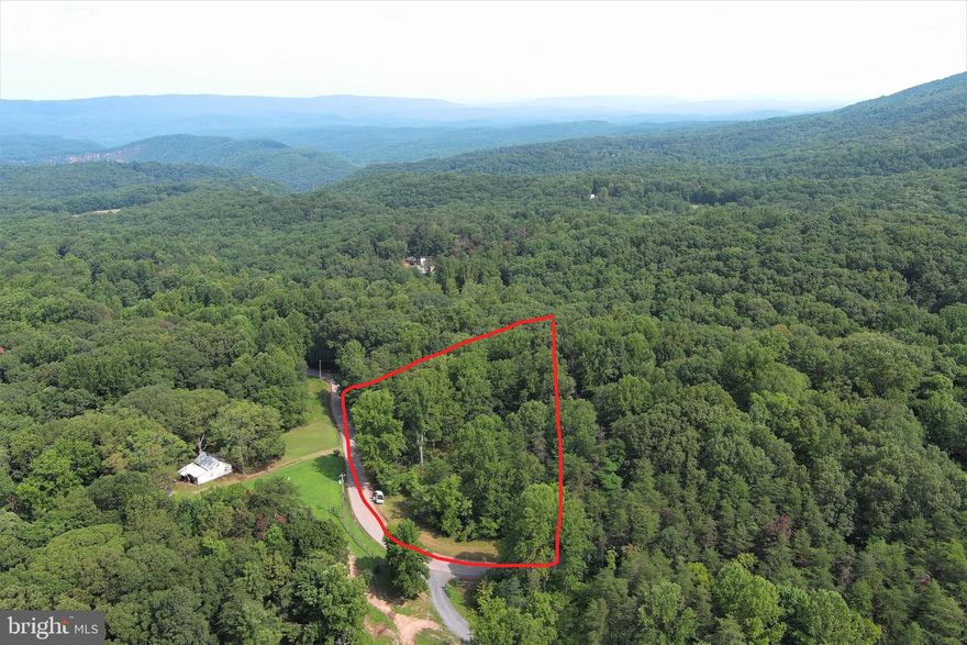 UNRESTRICTED! 2 UNRESTRICTED WOODED ACRES FRONTING ON MAGNOLIA ROAD, A QUIET PAVED COUNTRY ROAD. LAND LAYS NICE AND IS COVERED IN HUGE HARDWOODS, ELECTRIC ON THE PROPERTY. SECLUDED BUILDING SITE AT BACK OF PROPERTY ON SMALL RIDGE. ONLY 1/4 MILE FROM "SIDELING HILL WILDLIFE MANAGEMENT AREA" 1500 ACRES OF PUBLIC HUNTING AND HIKING. MAKE THIS YOUR BASE CAMP OR BUILD YOUR FULL TIME HOME. NO HOA + NO RESTRICTIONS = NO PROBLEMS! AN OUTDOORSMANS PARADISE, SO CLOSE TO SO MANY OUTDOOR ACTIVITIES.....WALK TO PUBLIC HUNTING, SHORT DRIVE TO THE CACAPON & POTOMAC RIVERS! THIS SOUNDS LIKE A GREAT DEAL....BECAUSE IT IS! NO NEED TO OVERTHINK THIS ONE, COME GET IT!
